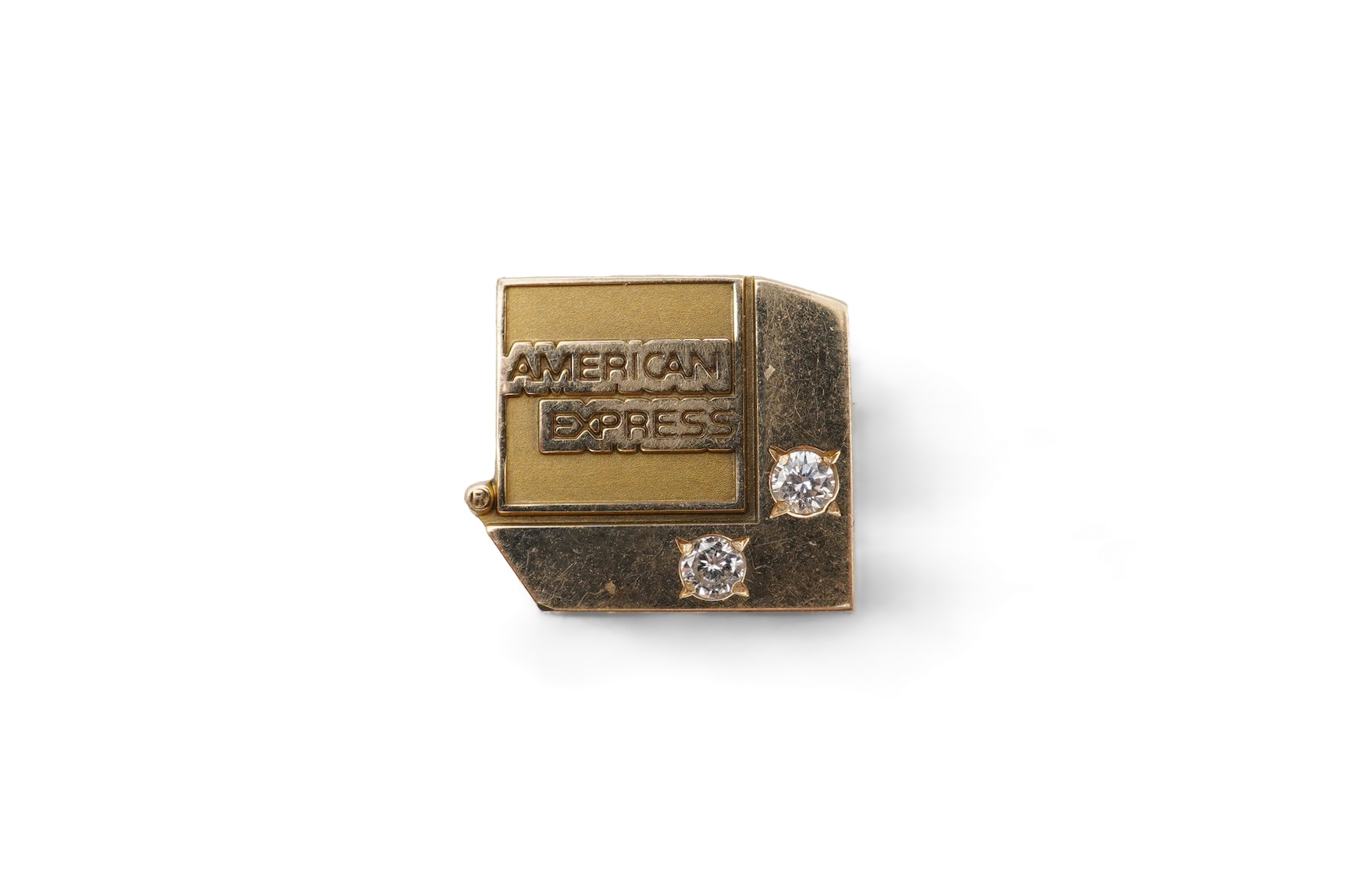 A gold and diamond novelty pin